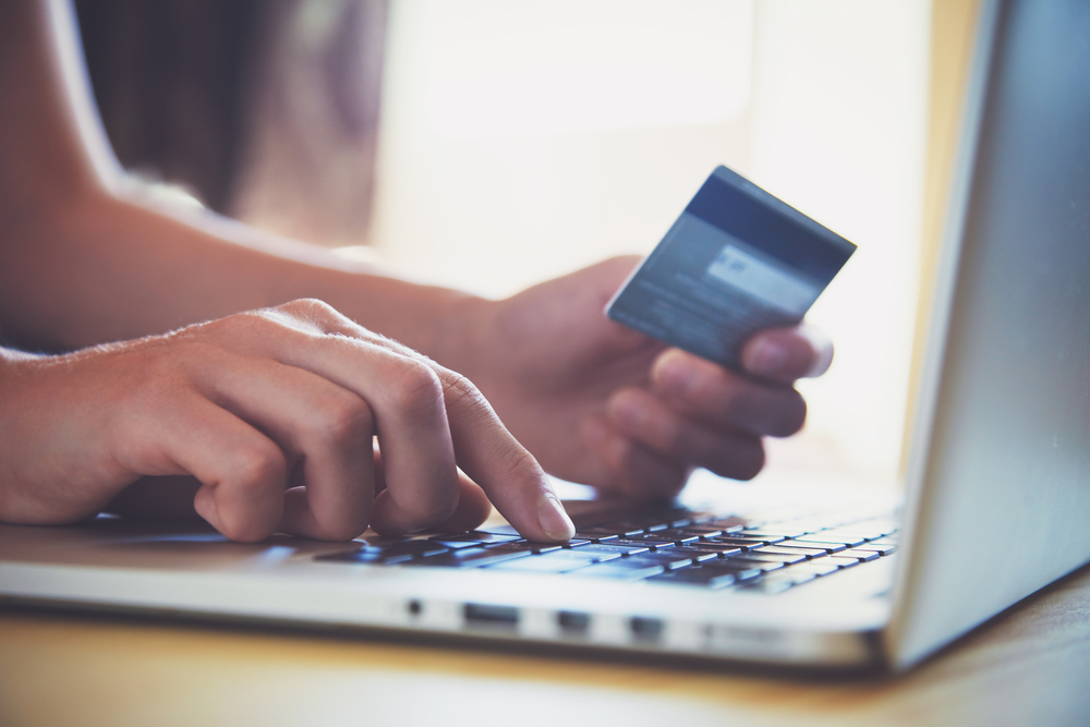 Woman adding payment card details to website