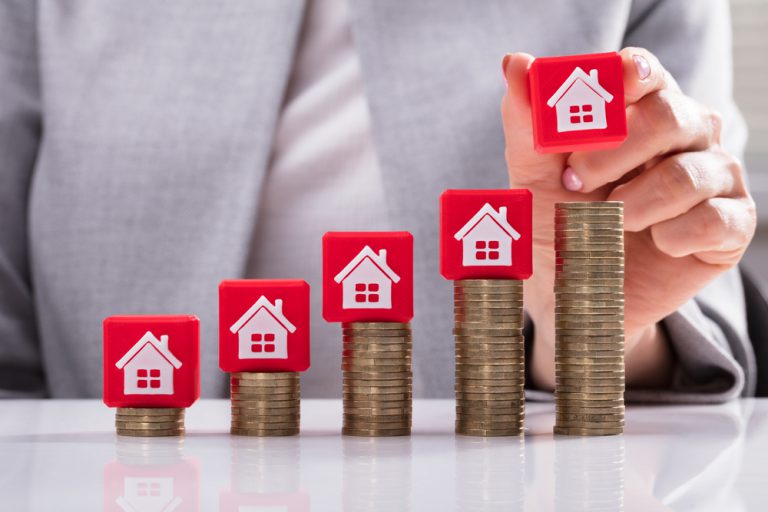 Red Blocks with White Houses on Coins